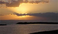 Sonnenuntergang Playa de las Americas und La Gomera